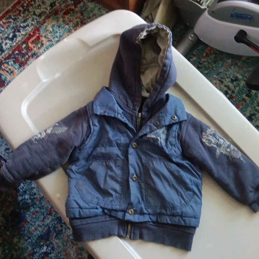 Calvin Klein hoodie and attached vest coat